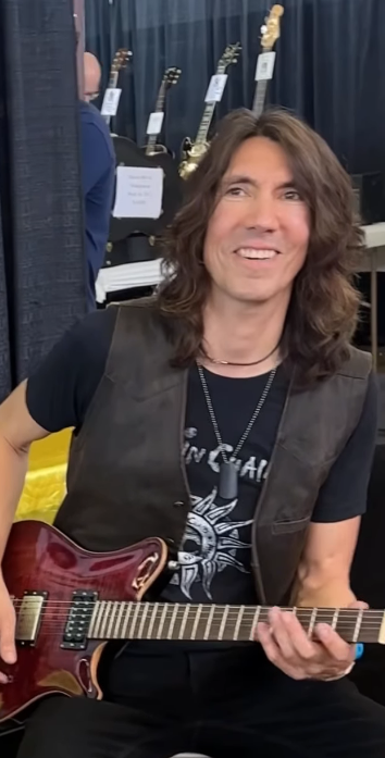 Derek Neece playing guitar